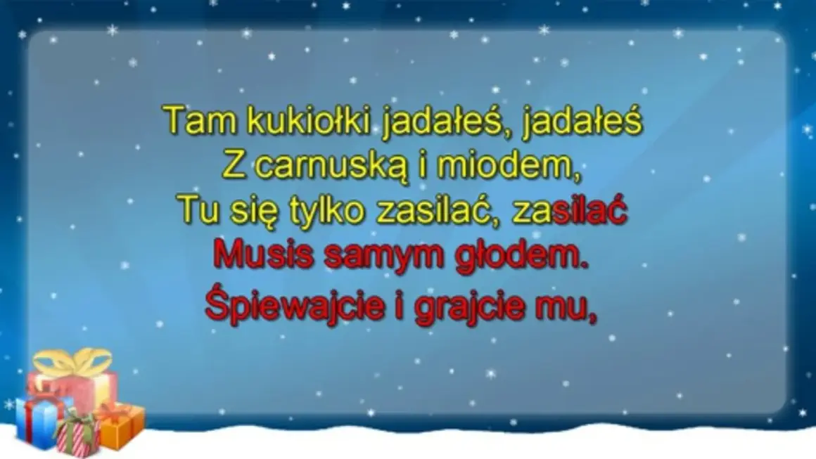 Śnieżna sceneria z prezentami i tekstem piosenki: "Tam kukiołki jadałeś... Śpiewajcie i grajcie mu".